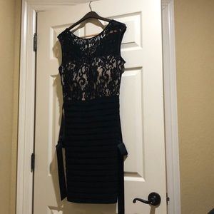 Black Cache dress with tags, size 12. Imported fabric. Made in the USA.
